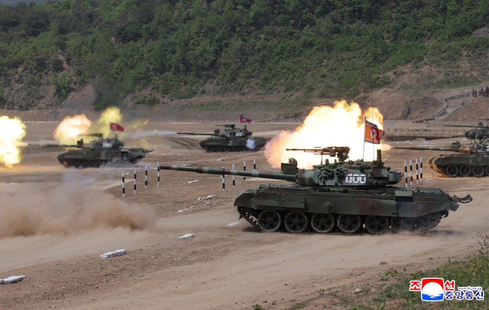Respected Comrade Kim Jong Un Inspects Combined Tactical Drill of Different Arms Conducted under Training Course of Conference of Training Officers of KPA