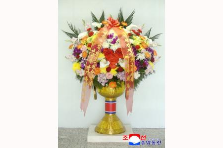 Respected Comrade Kim Jong Un Receives Flower Basket from Abroad